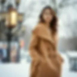 Stylish beige coat draped elegantly against a winter backdrop.