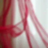 Elegant burgundy tulle fabric draped artistically