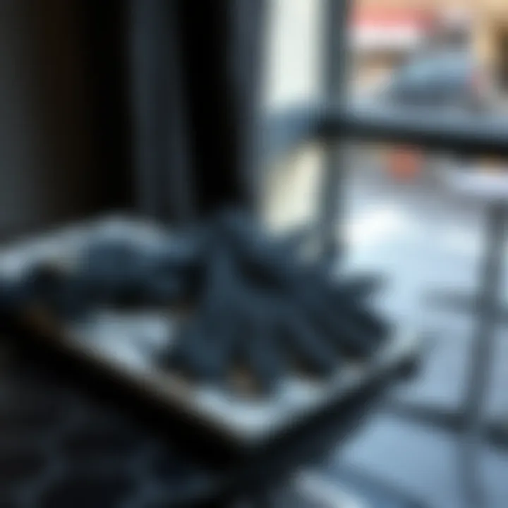 Fashionable display of black gloves on a stylish table