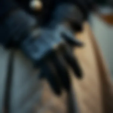 Close-up of intricate designs on black gloves