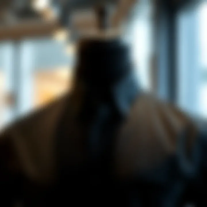 A stylish black shirt on a mannequin showcasing modern fashion cuts