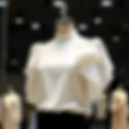 Elegant white blouse on a mannequin showcasing modern design.