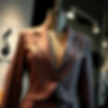 A stylish short blazer jacket draped elegantly on a mannequin