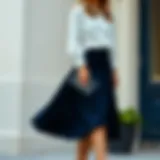 Elegant navy blue flared skirt styled with a chic blouse