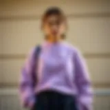 Stylish lilac sweatshirt paired with complementary colors