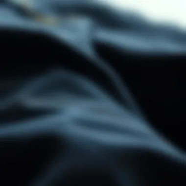 Close-up of fabric texture of black wide-leg denim