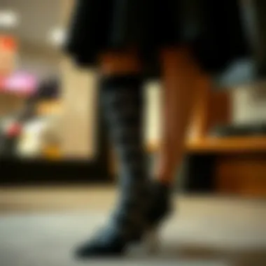 Chic black dress accessorized with patterned socks.