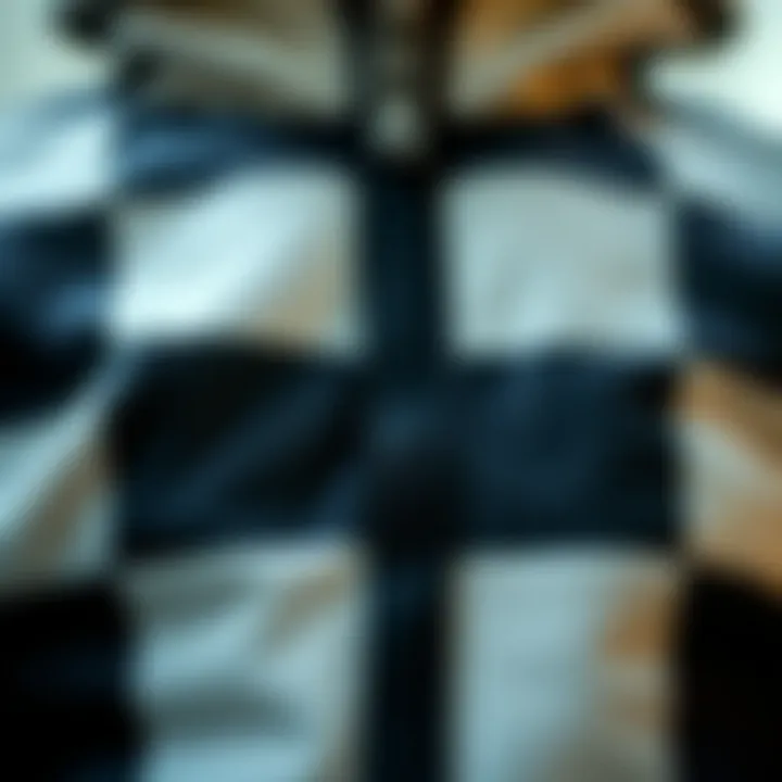 Close-up of the unique fabric texture of the checkered tracksuit.