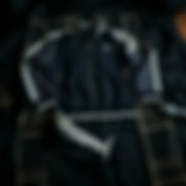 A stylish black checkered tracksuit laid out creatively.