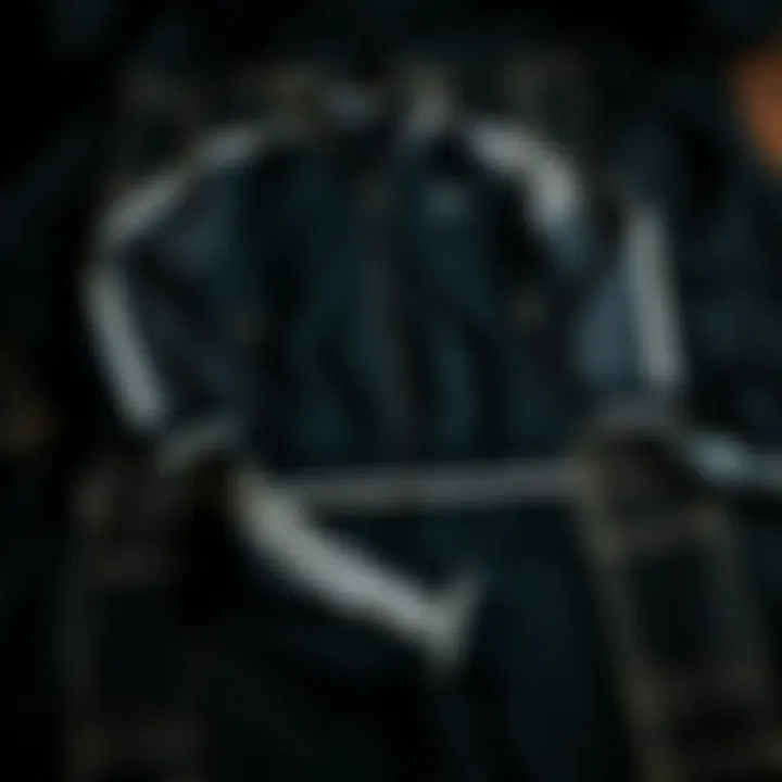 A stylish black checkered tracksuit laid out creatively.